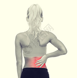 运动的女性触摸着她的背部肌肉手臂运动装娱乐痛苦女孩锻炼身体事故背痛图片