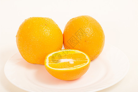 新鲜橙色白色饮食食物玻璃皮肤黄色热带甜点团体盘子背景图片