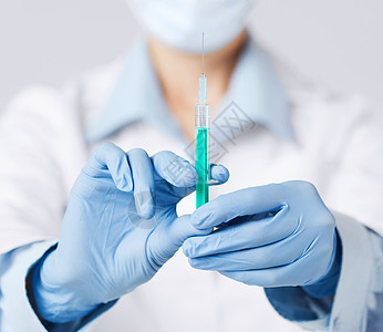 持有注射注射针管的女医生男人手术治愈保健注射器麻醉护士抗生素手套房间图片