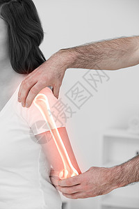 理疗师的女高血压骨医生肩膀女士上肢手臂女性辉光药品理疗拉伸图片