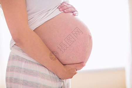 怀着重力的孕妇服装女性待产护理怀孕腹部睡衣孕妇装女士休闲背景图片
