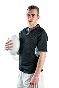 持有橄榄球的橄榄球运动员男性体育竞技竞赛男人球衣播放器服装运动头发图片