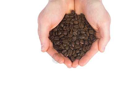 近距离观看显示咖啡豆的手产品生产男人贸易双手咖啡男性豆子图片