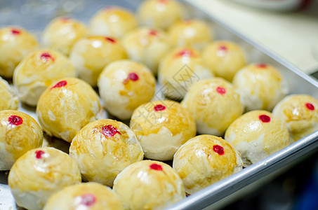 中国糕点或月饼 中国节日甜点美食金属食物蛋糕小吃面团月亮烹饪文化面粉图片