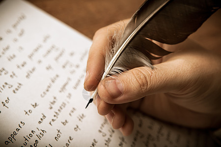 写作家在纸面作品上写笔回忆录故事床单墨水制作者短文宏观浪漫挫折诗人图片