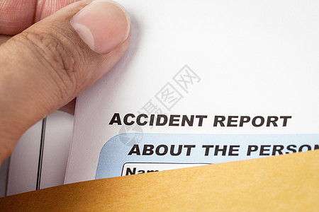 事故报告申请表及褐色信封和纸笔e药品政策情况医生风险保健文书合同计算器金融图片