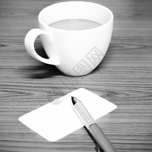 咖啡杯和名卡黑白色音调风格Name品牌收藏杯子公文包身份商业卡片打印推广木头图片