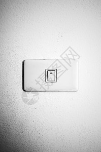 在墙壁黑白颜色风格上的白开关控制电气白色活力塑料力量房子技术开关图片