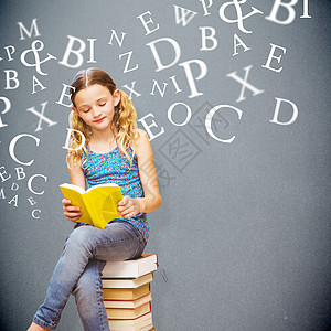 图书馆中可爱小女孩阅读书综合形象的合成图象头发浅色教育女孩知识文学辫子教科书砖墙图书图片