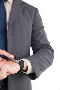商务人士用他的聪明手表商务移动夹克手腕公司技术商业时间腕表套装图片
