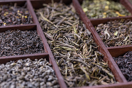 干茶叶绿色叶子香气团体芳香收藏黑色盒子植物图片