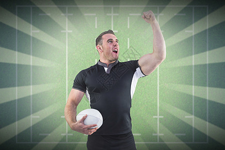 橄榄球运动员与球一起欢乐的复合图像欣快感沥青成就球衣欢呼肌肉运动竞赛男人运动服图片