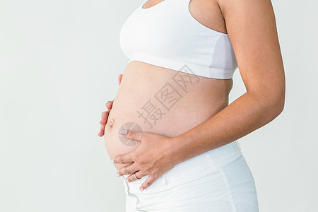 孕妇触摸胃部图片