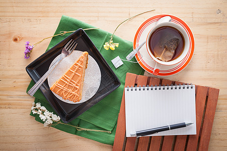 泰国茶蛋糕加笔记本会议糕点日记记录场景食物木头商业软垫营养图片