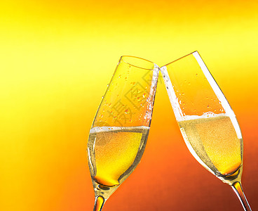 两笛香槟 配有黄金泡泡和文字空间的香槟水晶周年胜利玻璃假期干杯奢华长笛金子嘶嘶图片