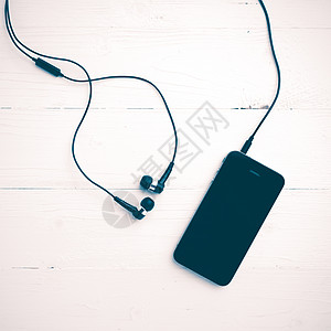 小龙虾图片有耳机古代风格的手机细胞电话白色电缆娱乐玩家音乐播放器耳塞技术按钮背景