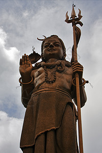 印度教的金雕像 什叶派金属天空寺庙祷告切口卷曲历史纪念碑套装金子图片