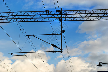 电线绝缘体力量蓝色网络活力运输电缆天空电压金属图片