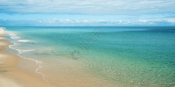 Tangalooma岛海滩的视图太阳支撑天空海景海浪假期海岸海岸线风景海洋图片