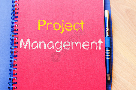项目管理书写在笔记本上时间资金预算经理战略工作资源组织推介会研讨会图片