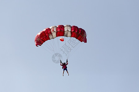 不明的空中潜水员 降落伞兵运动员漂浮太阳练习曲运动自由男人翅膀情感旅行图片