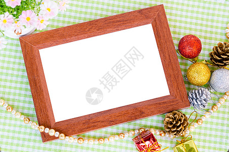 木质相框和圣诞节装饰花朵高清图片