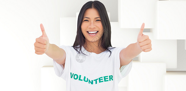 妇女身穿志愿运动衫 举起大拇指的复合形象绘图道德拇指黑发福利白色数字女士女性快乐图片