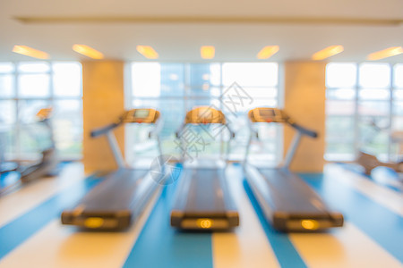 健身俱乐部背景模糊办公室中心健康健身房权重运动建筑学娱乐房间跑步机图片