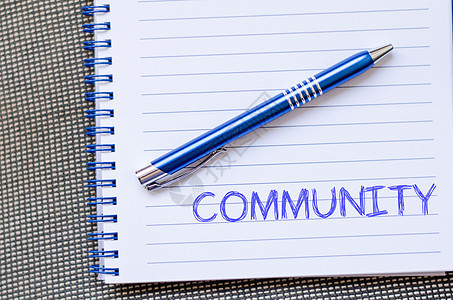 社区在笔记本上写字标签机构团队合伙友谊合作团体家庭宽慰成人图片
