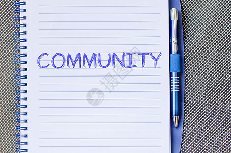 社区在笔记本上写字合伙邻里服务宽慰志愿者标签工作商业帮助成人图片
