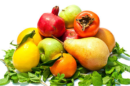 有很多不同的水果和绿色叶子 在白色背景的白背景下热带纤维柿子饮食石榴活力坚果甜点柠檬果味图片