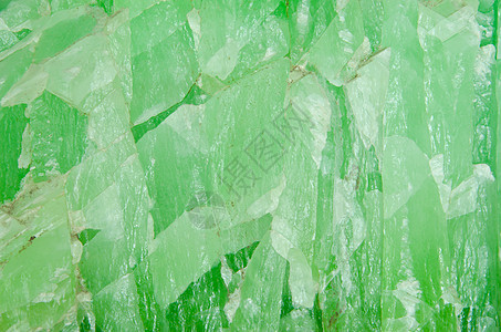 天然的翡翠表面白色反射水晶岩石绿色奢华墙纸矿物玻璃首饰图片