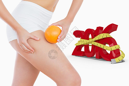 身体健康的女人在大腿上挤压脂肪时的复合形象 因为她握着橙色卷尺灰色饮食生活方式计算机短裤插图绘图女士营养图片