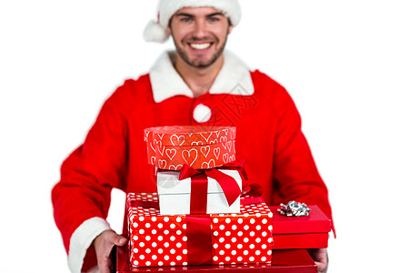 穿着圣塔装的快乐男人 有礼物喜庆男性红色微笑假期时候胡须舞会服装白色图片