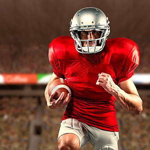 红球衣赛跑中美国足球运动员的复合形象橄榄球球衣运动头饰竞技场四分卫沥青体育场体育竞技图片