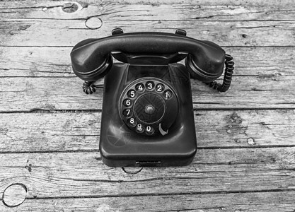 木制旧电话木制背景发明黑色乡愁旋转固定电话合金技术金属塑料木头图片