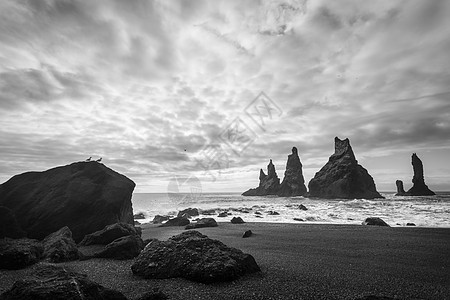 冰岛的沿海景观远足火山气候天空远景海滩旅行孤独黑与白风暴图片