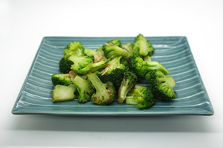 盘子上的花椰菜菜花炙烤棕色乡村木头食物蒸汽农业美食营养图片