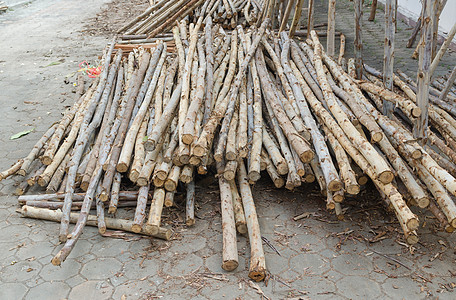 建筑工地的Lumber堆积木材业颗粒状商业院子横截面软木棕色建材木材木梁图片