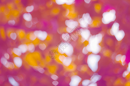 Bokeh 心脏形状光背景摄影装饰自然现象温度热量橙色粉色图案浪漫庆典图片