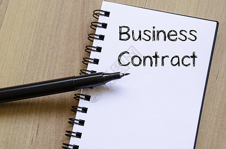 商业合同在笔记本上写字工作权利银行业员工陈述签约政策合作力量文档图片