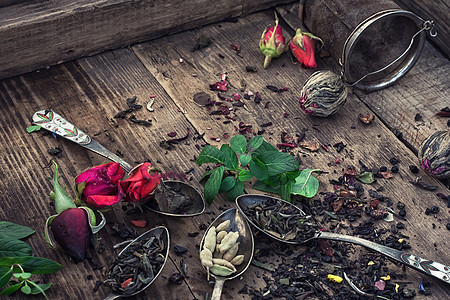 草药茶收集品种花瓣木头植物早餐杯子草本植物药品勺子芳香花束图片