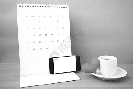 咖啡 电话 日历和心脏木头笔记本工作备忘录礼物办公室商业风格桌子日程图片