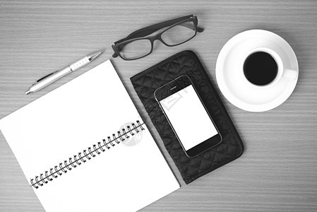咖啡 电话 眼镜 笔记和钱包细胞笔记本成功商业木头技术杯子桌子工作电脑图片