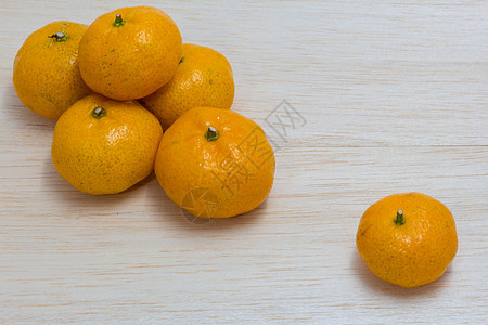 木本的橙色果汁热带水果红色绿色木头柚子桌子橙子饮食图片