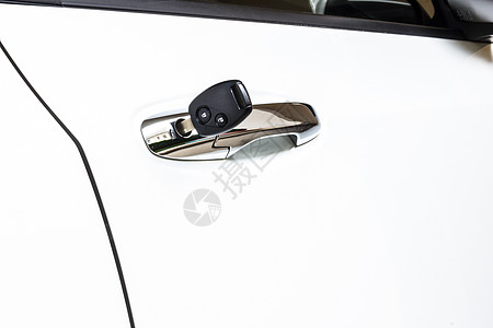 洞口的车钥匙运输控制安全汽车钥匙扣黑色技术按钮白色塑料金属图片