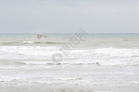 海中美丽的海浪海岸线蓝色阳光海滩地平线旅行天空太阳海洋支撑图片