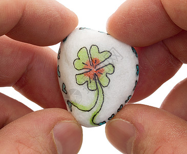 一块石 画着四小颗心的花朵手指男人石头财富幸福祝福铁石植物学假期花园图片