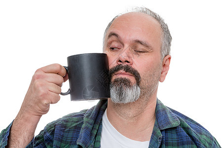 醒着男人为喝咖啡而挣扎图片