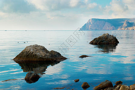 海边的石头地平线海洋太阳冲浪天空假期海岸支撑旅行墙纸图片